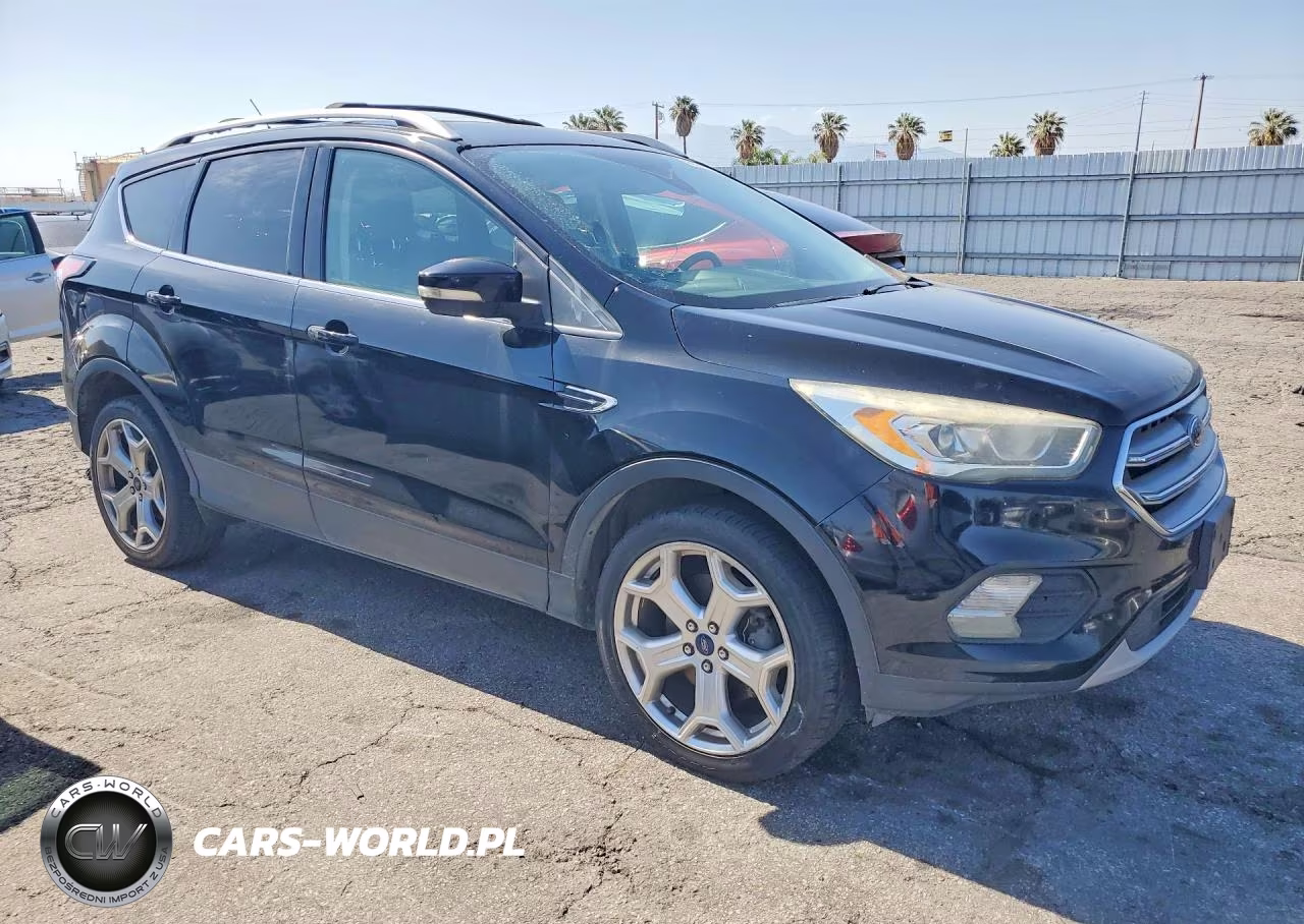 2017 Ford Escape Titanium VIN:1FMCU9JDXHUF04000 - 4