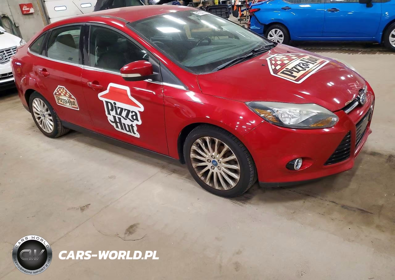 2012 Ford Focus Titanium VIN:1FAHP3J21CL145430 - 4