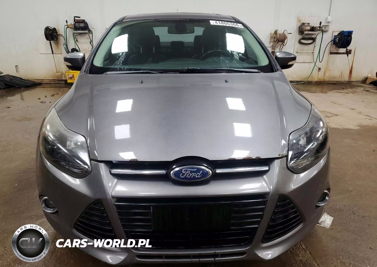 2012 Ford Focus Titanium VIN:1FAHP3J24CL194671 - 5
