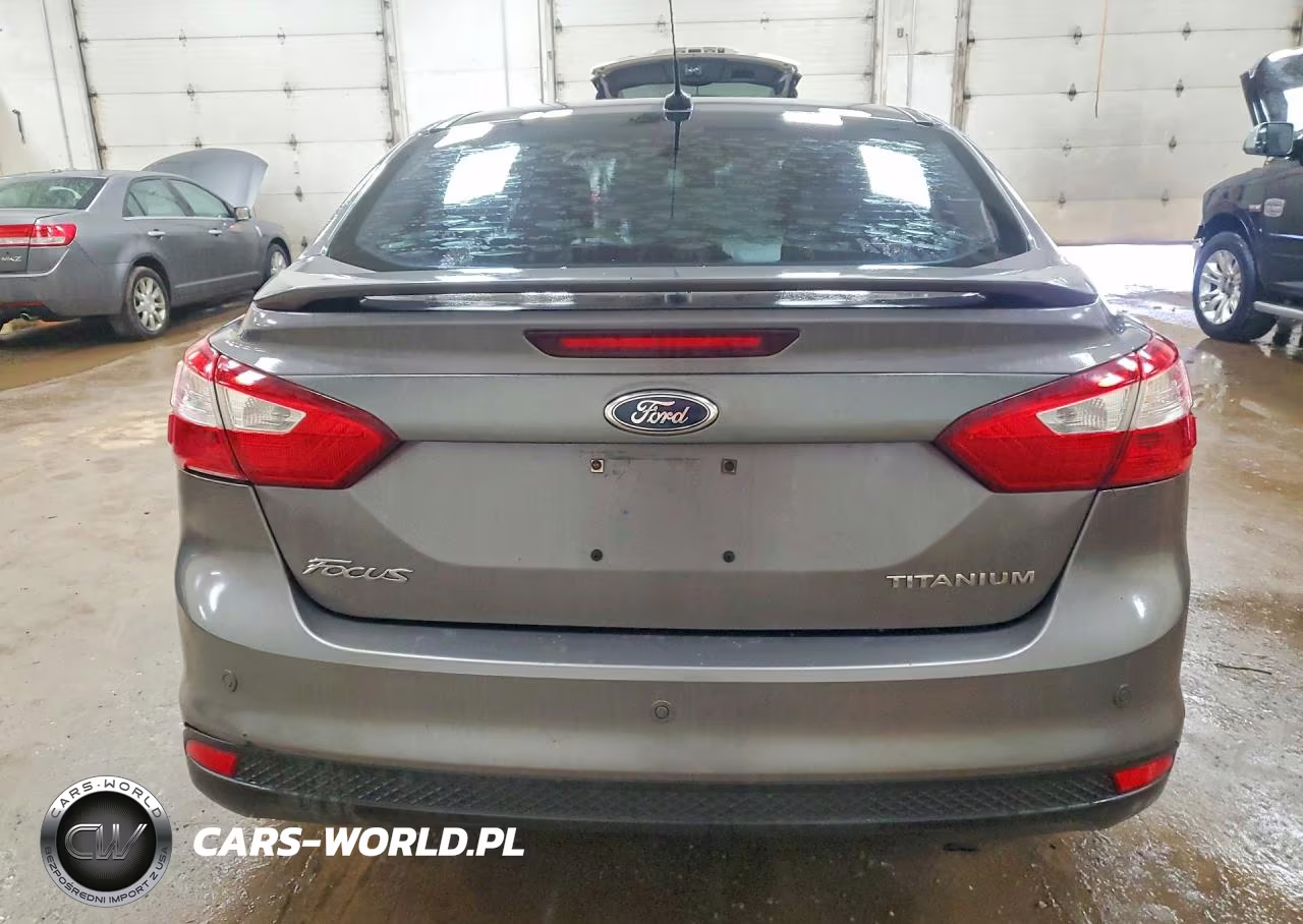 2012 Ford Focus Titanium VIN:1FAHP3J24CL194671 - 6