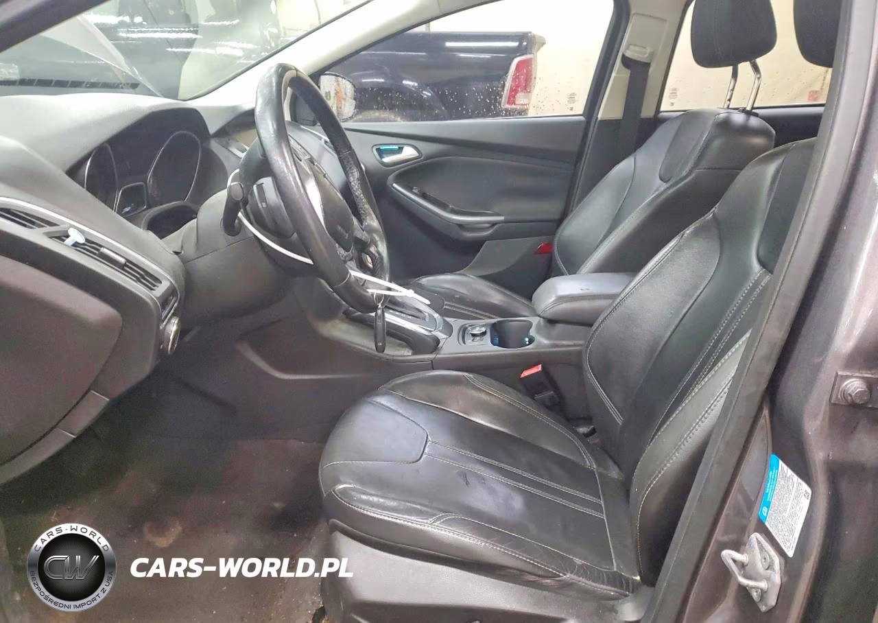 2012 Ford Focus Titanium VIN:1FAHP3J24CL194671 - 7