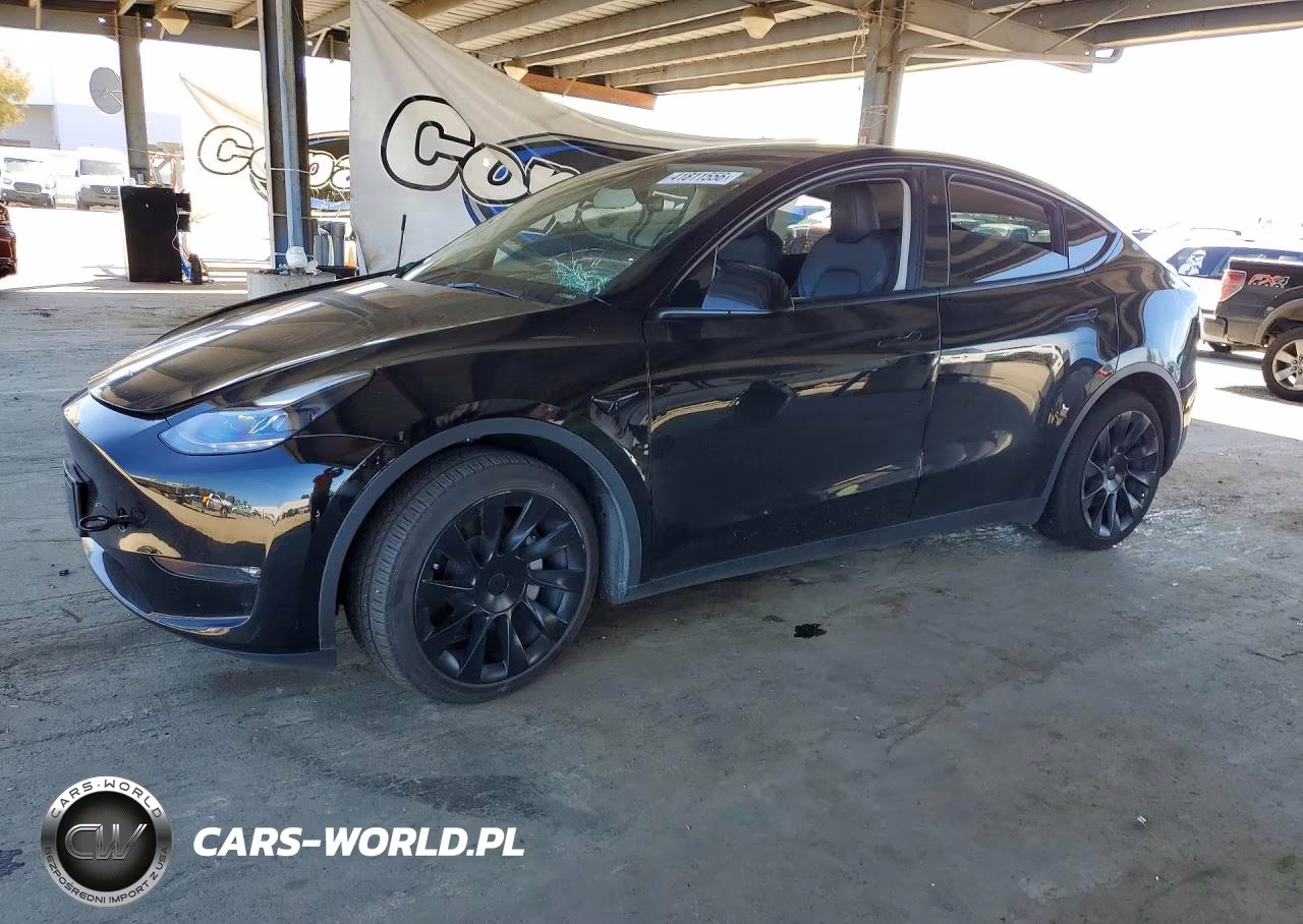 2023 Tesla Model Y VIN:7SAYGAEE2PF926486 - 1