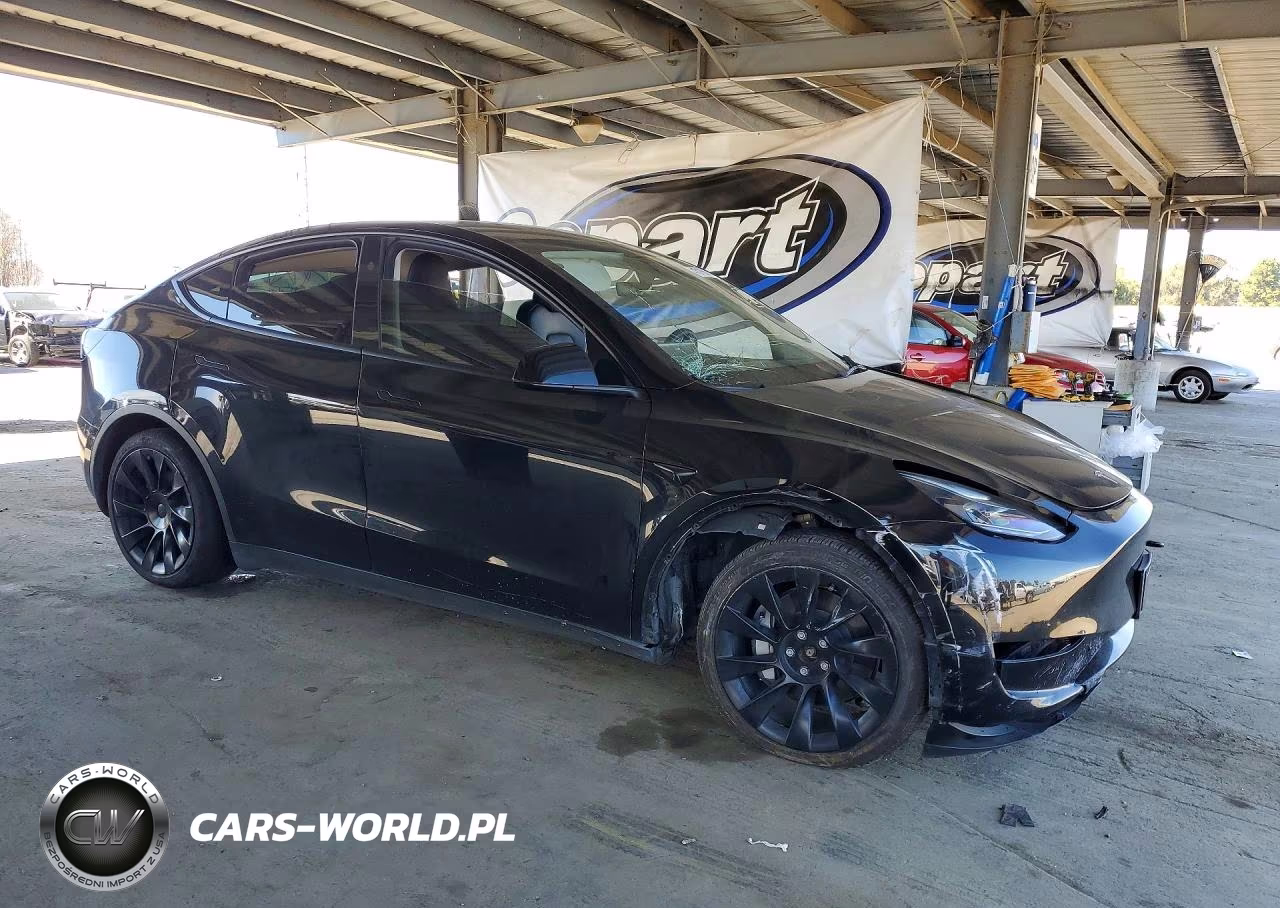 2023 Tesla Model Y VIN:7SAYGAEE2PF926486 - 4