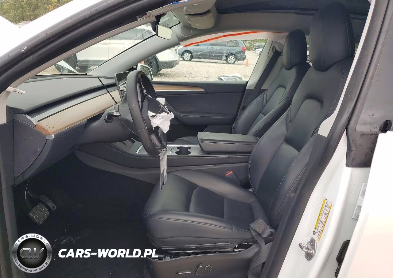 2023 Tesla Model Y VIN:7SAYGDEE3PF601847 - 7