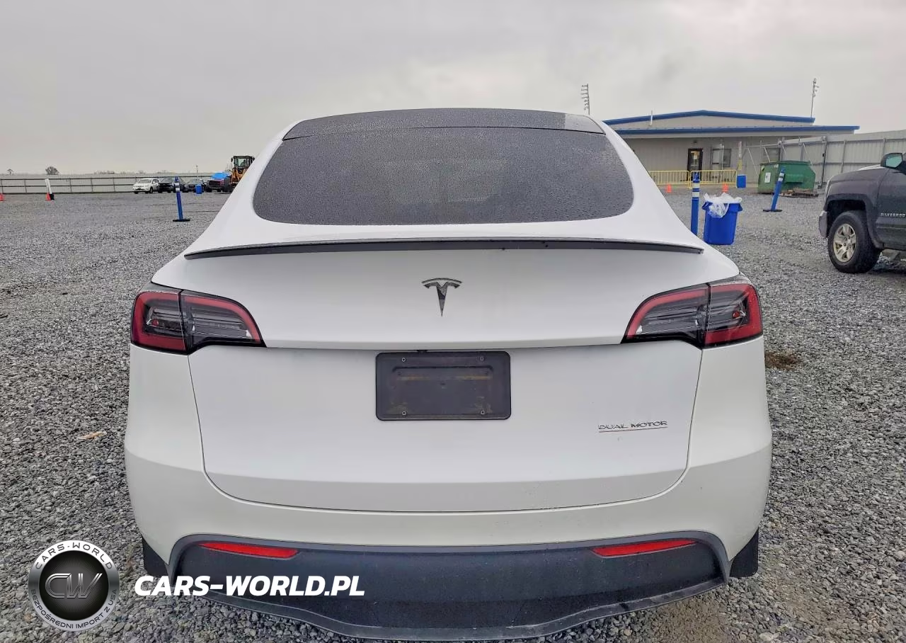 2023 Tesla Model Y VIN:7SAYGDEF5PF665512 - 6