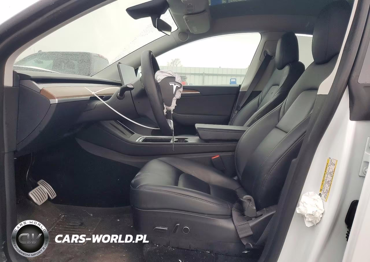 2023 Tesla Model Y VIN:7SAYGDEF5PF665512 - 7