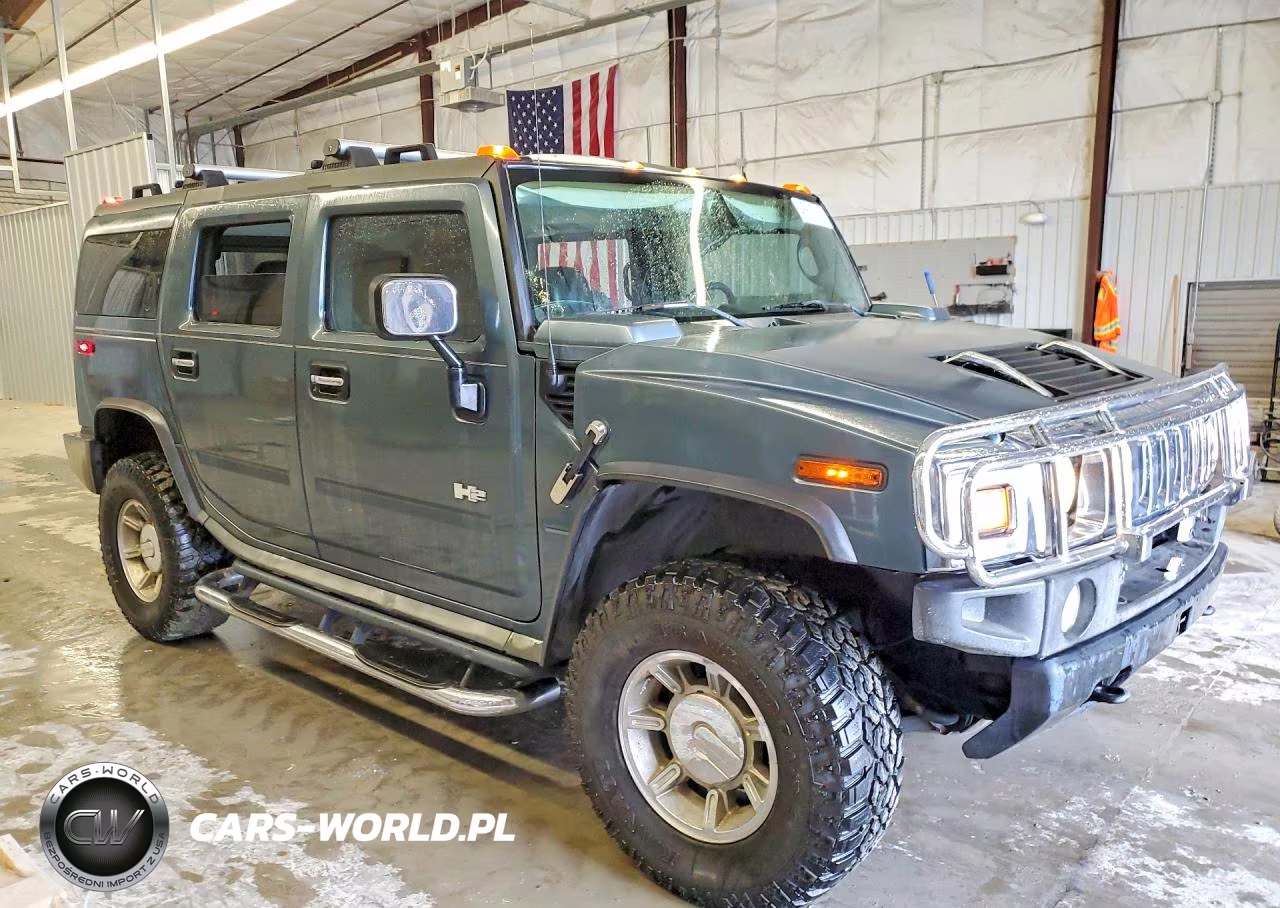 2005 Hummer H2 VIN:5GRGN23UX5H103752 - 4