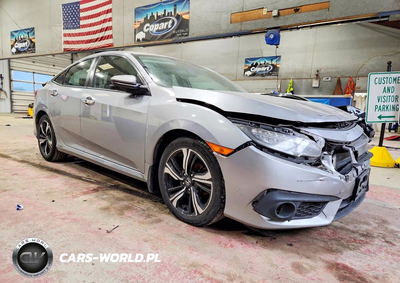 2017 Honda Civic Touring VIN:2HGFC1F9XHH100807 - 4