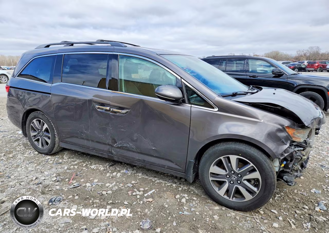 2014 Honda Odyssey Touring VIN:5FNRL5H9XEB093195 - 4