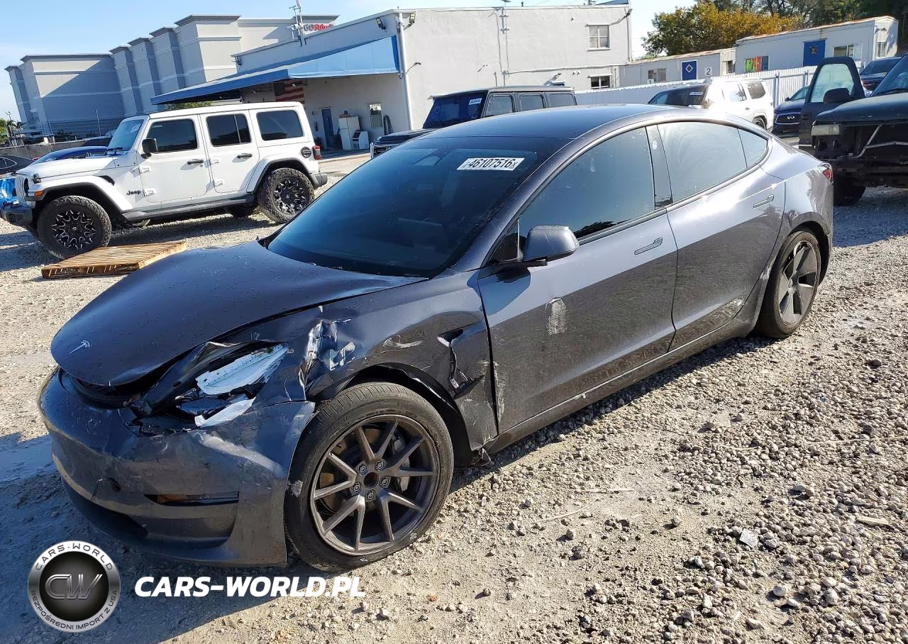 2023 Tesla Model 3 VIN:5YJ3E1EA0PF699390 - 1