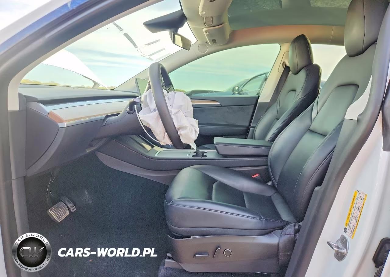 2023 Tesla Model Y VIN:7SAYGAEEXPF598556 - 7