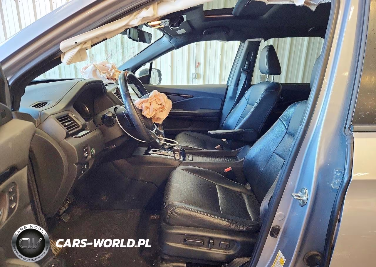 2019 Honda Passport Touring VIN:5FNYF7H90KB002283 - 7