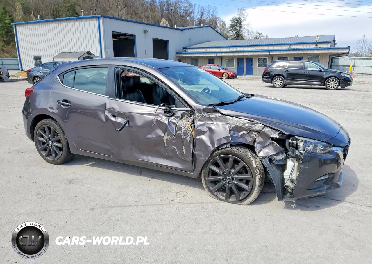 2018 Mazda 3 Touring VIN:3MZBN1L31JM240093 - 4