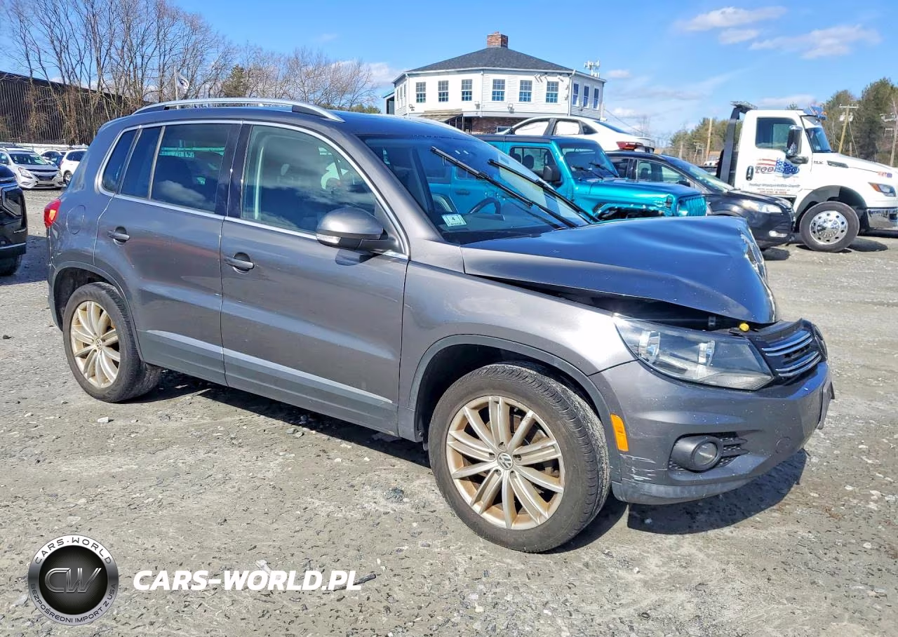 2014 Volkswagen Tiguan S VIN:WVGBV3AX6EW555994 - 4