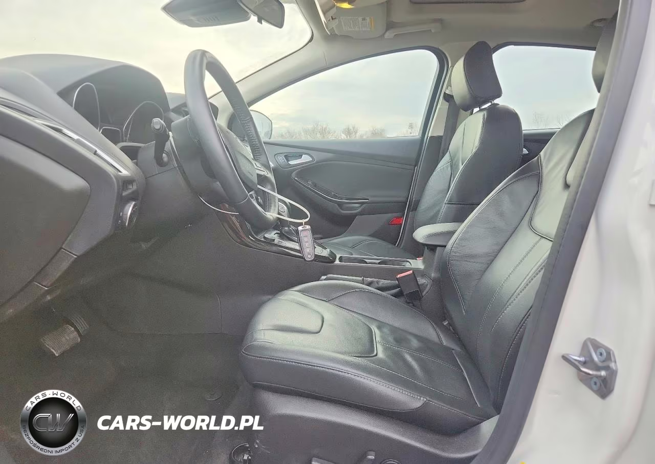 2017 Ford Focus Titanium VIN:1FADP3N23HL265939 - 7