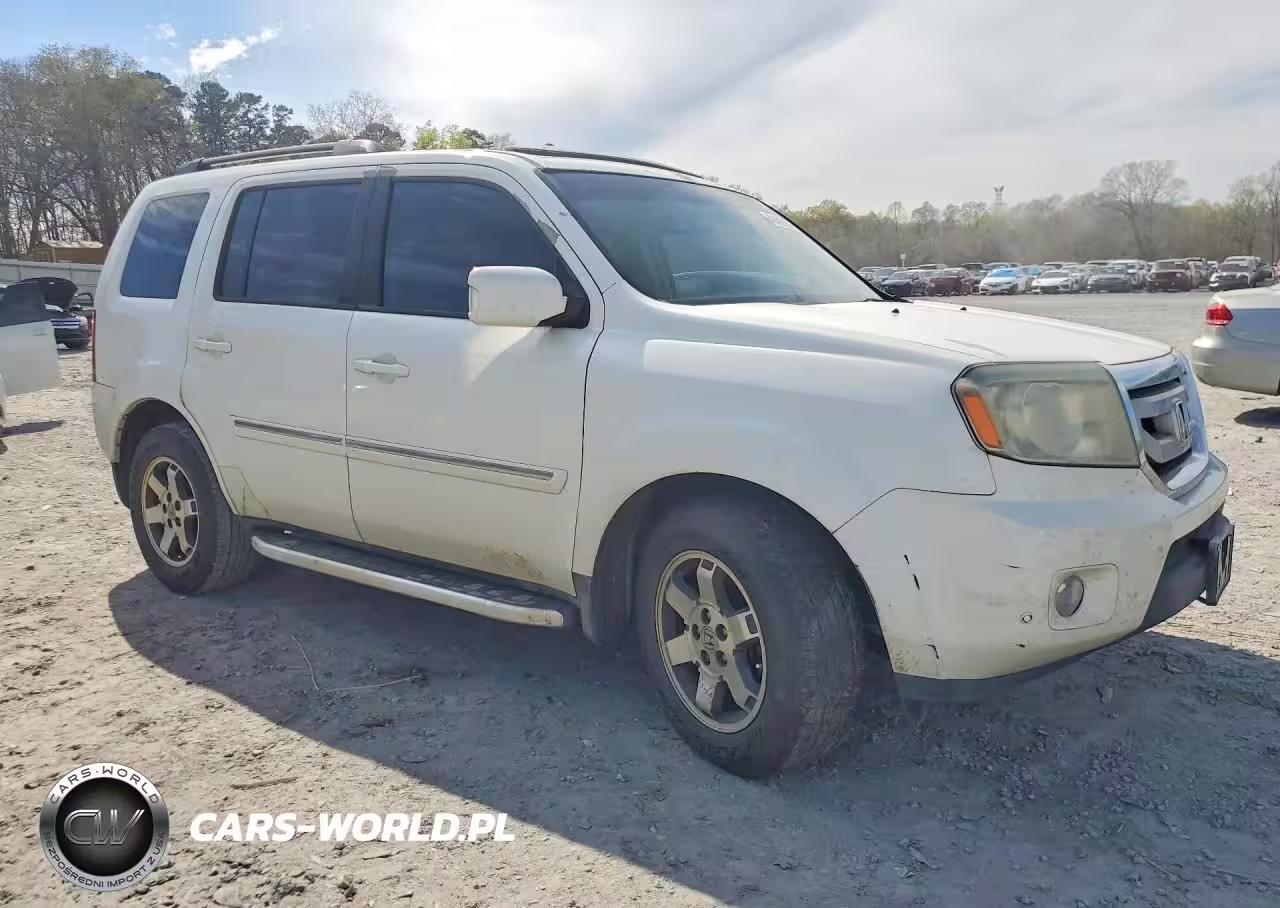 2011 Honda Pilot Touring VIN:5FNYF3H98BB026310 - 4
