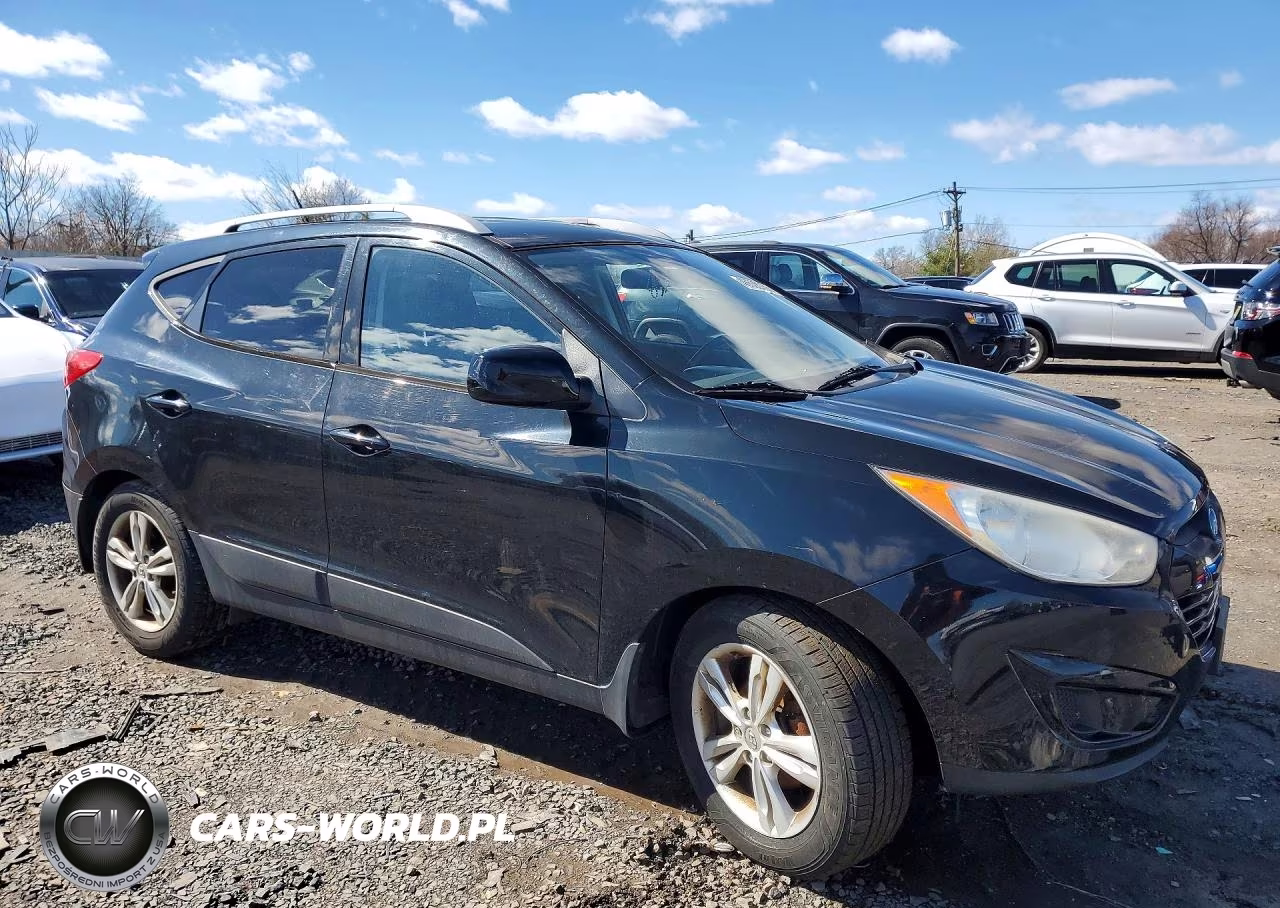 2011 Hyundai Tucson VIN:KM8JU3AC9BU244529 - 4
