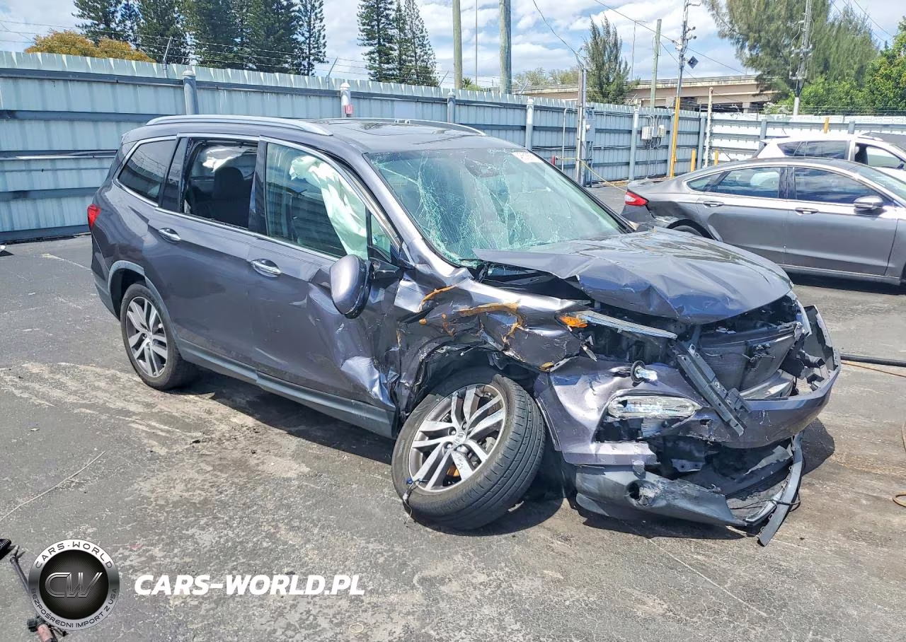 2017 Honda Pilot Elite VIN:5FNYF6H03HB092369 - 4