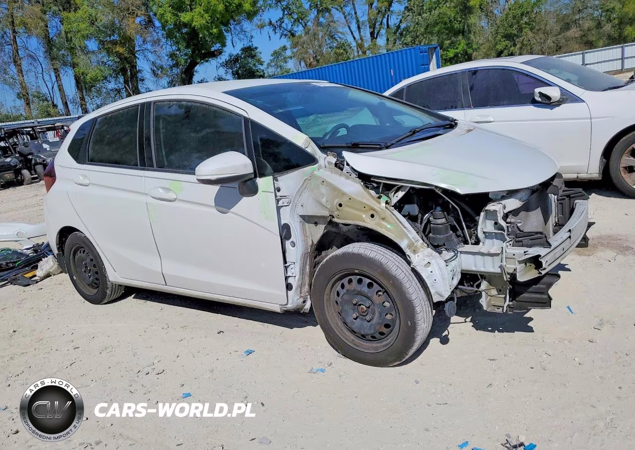 2018 Honda Fit Lx VIN:3HGGK5H49JM736058 - 4