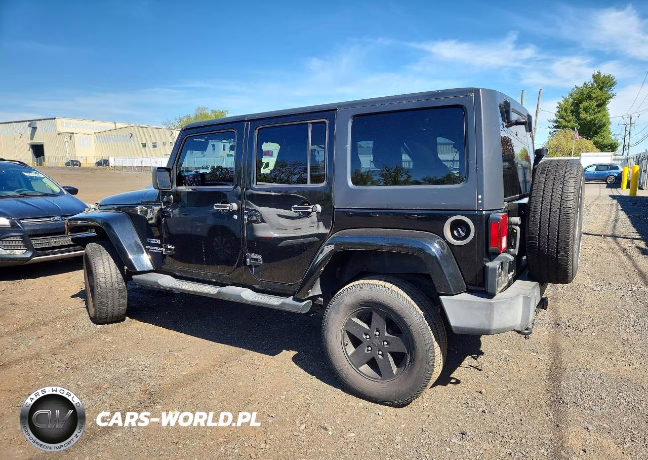 2012 Jeep Wrangler Unlimited Sport VIN:1C4HJWDGXCL203703 - 2