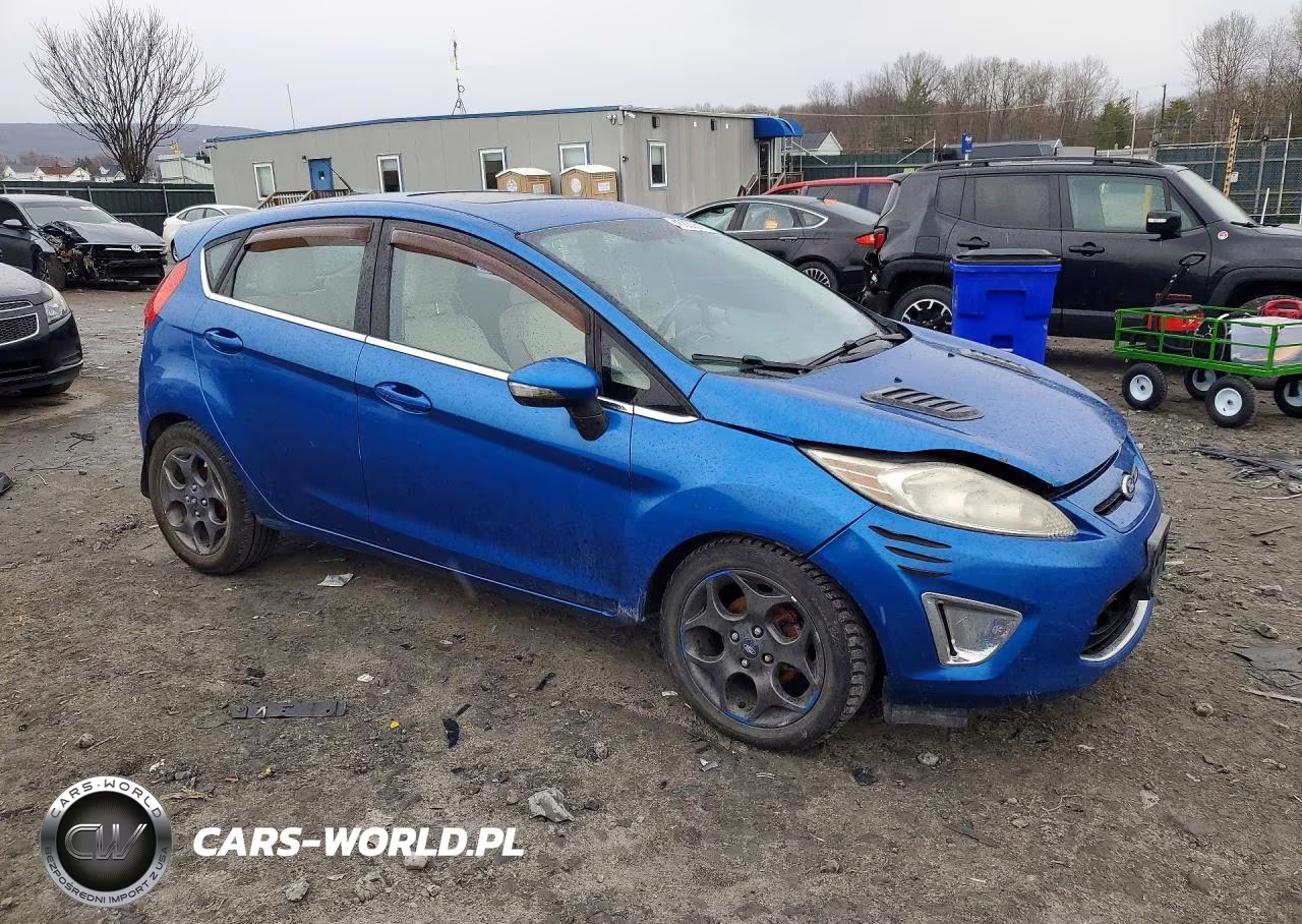2011 Ford Fiesta Ses VIN:3FADP4FJ2BM147673 - 4