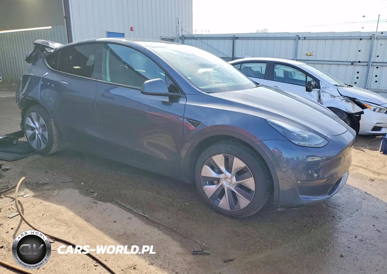 2023 Tesla Model Y VIN:7SAYGAEE9PF594272 - 4