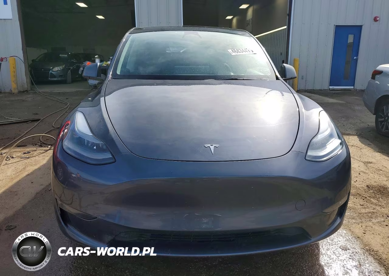 2023 Tesla Model Y VIN:7SAYGAEE9PF594272 - 5