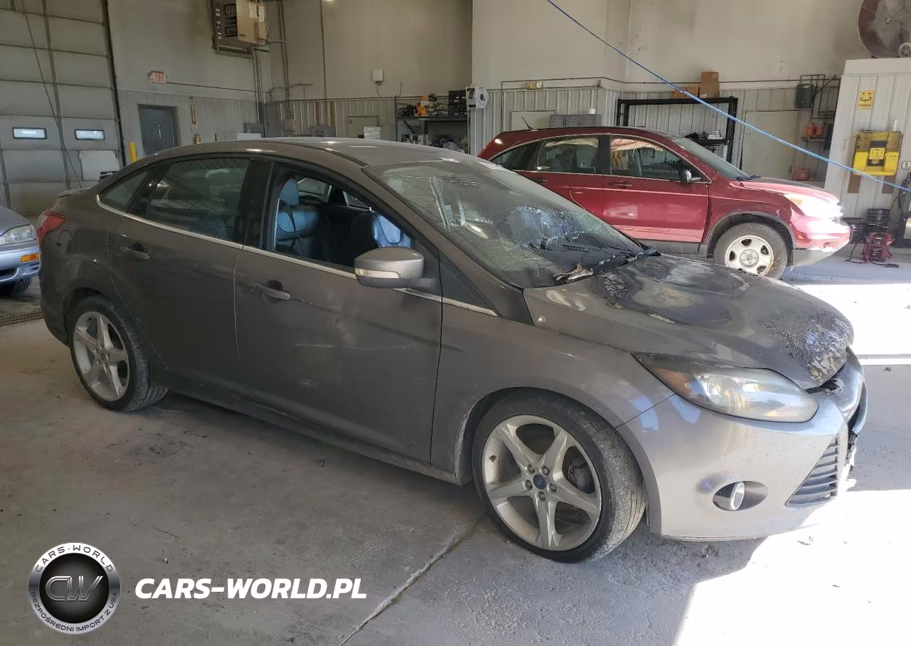 2012 Ford Focus Titanium VIN:1FAHP3J2XCL157933 - 4