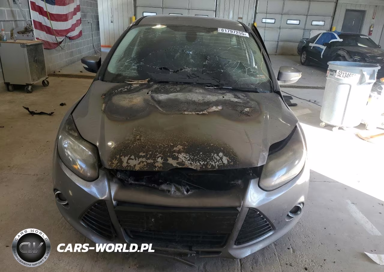 2012 Ford Focus Titanium VIN:1FAHP3J2XCL157933 - 5