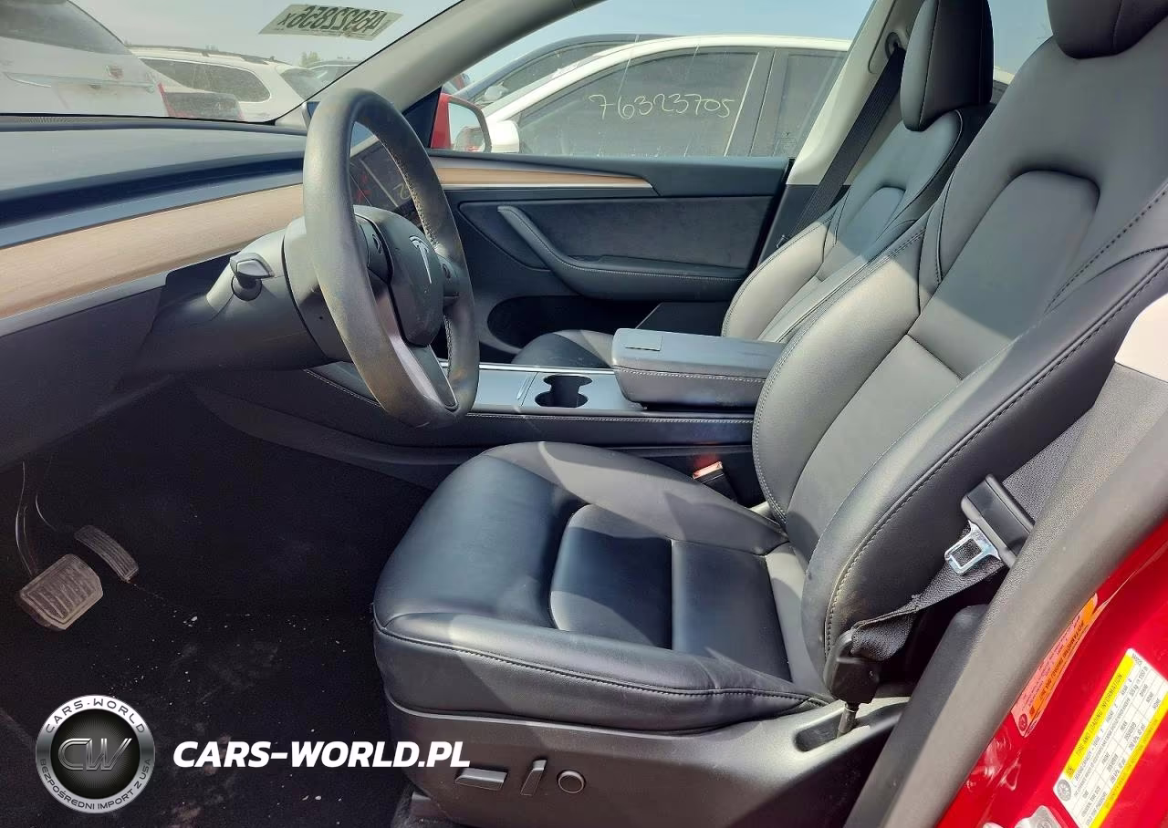 2023 Tesla Model Y VIN:7SAYGAEE6PF944229 - 7