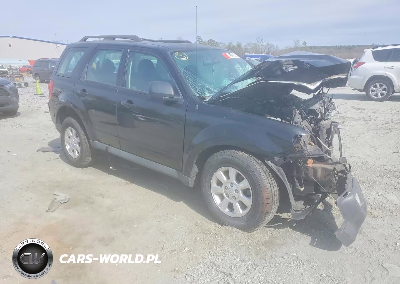 2011 Mazda Tribute I VIN:4F2CY0C74BKM02545 - 4