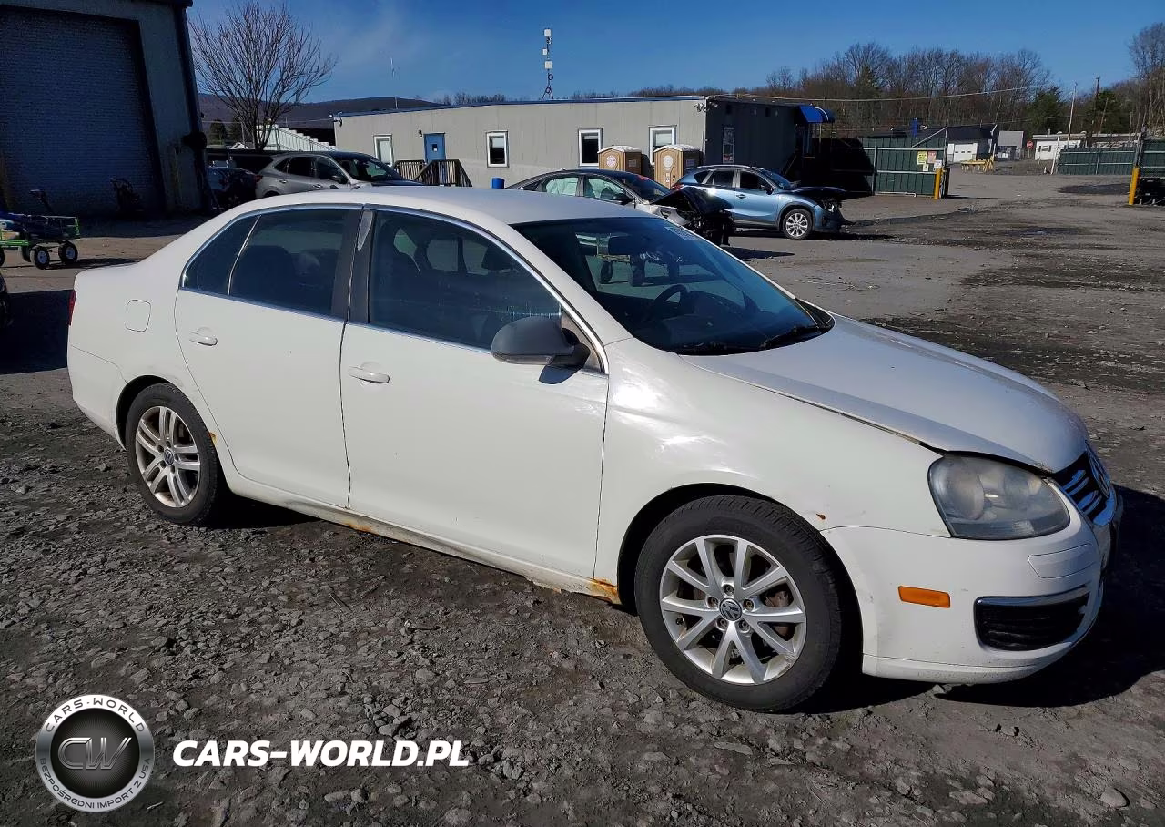 2009 Volkswagen Jetta VIN:3VWAL7AJ7AM028918 - 4