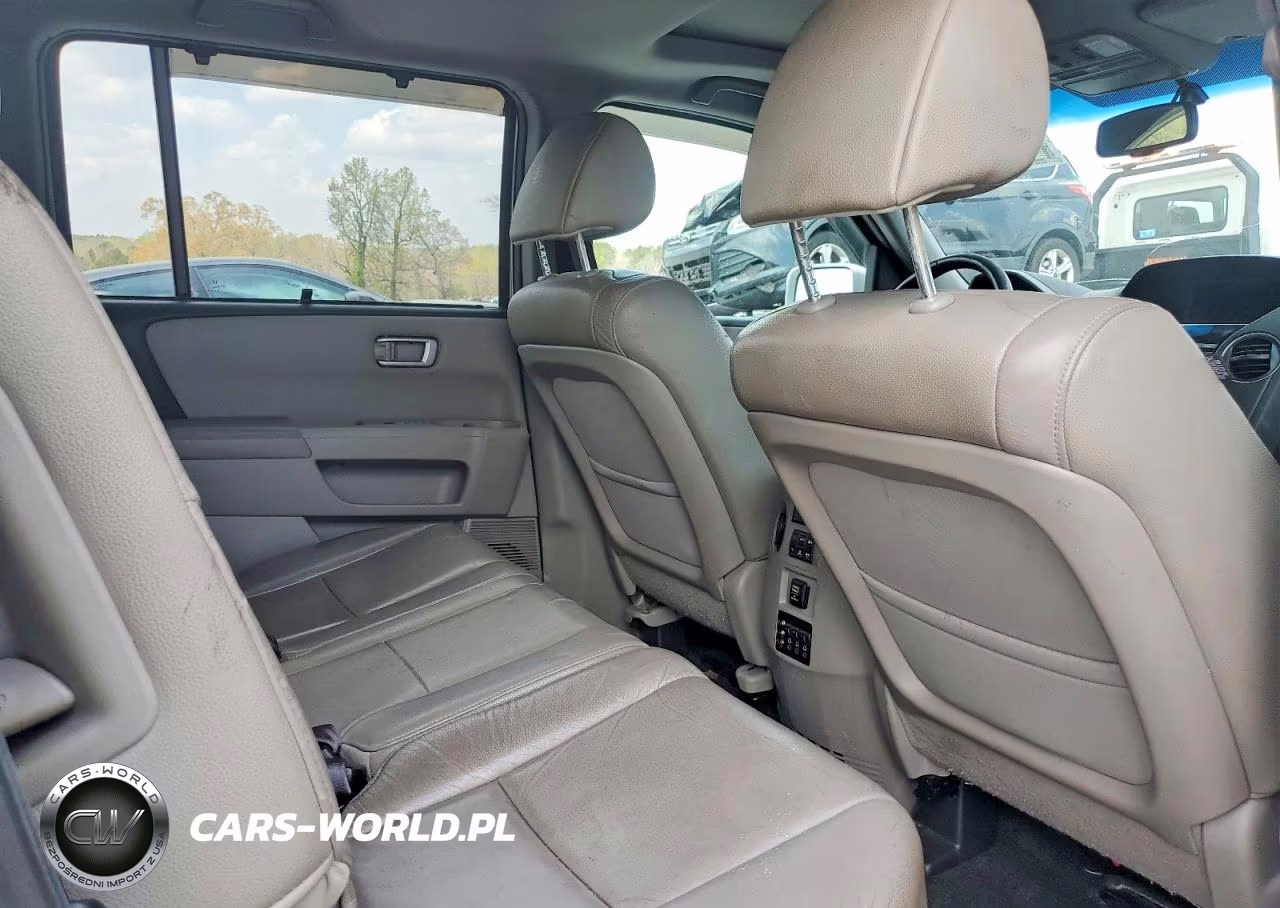 2012 Honda Pilot Touring VIN:5FNYF3H97CB024565 - 11