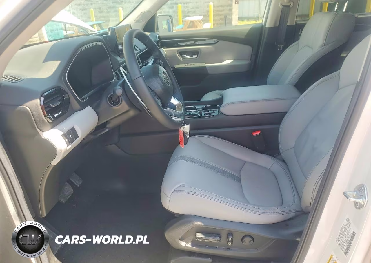 2025 Honda Pilot Touring VIN:5FNYG1H70SB176881 - 7