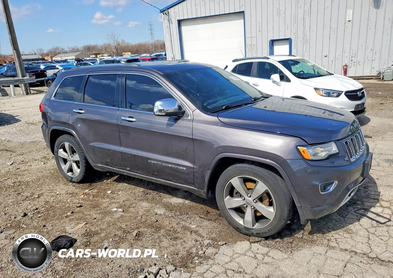2015 Jeep Grand Cherokee Overland VIN:1C4RJFCM4FC791145 - 4
