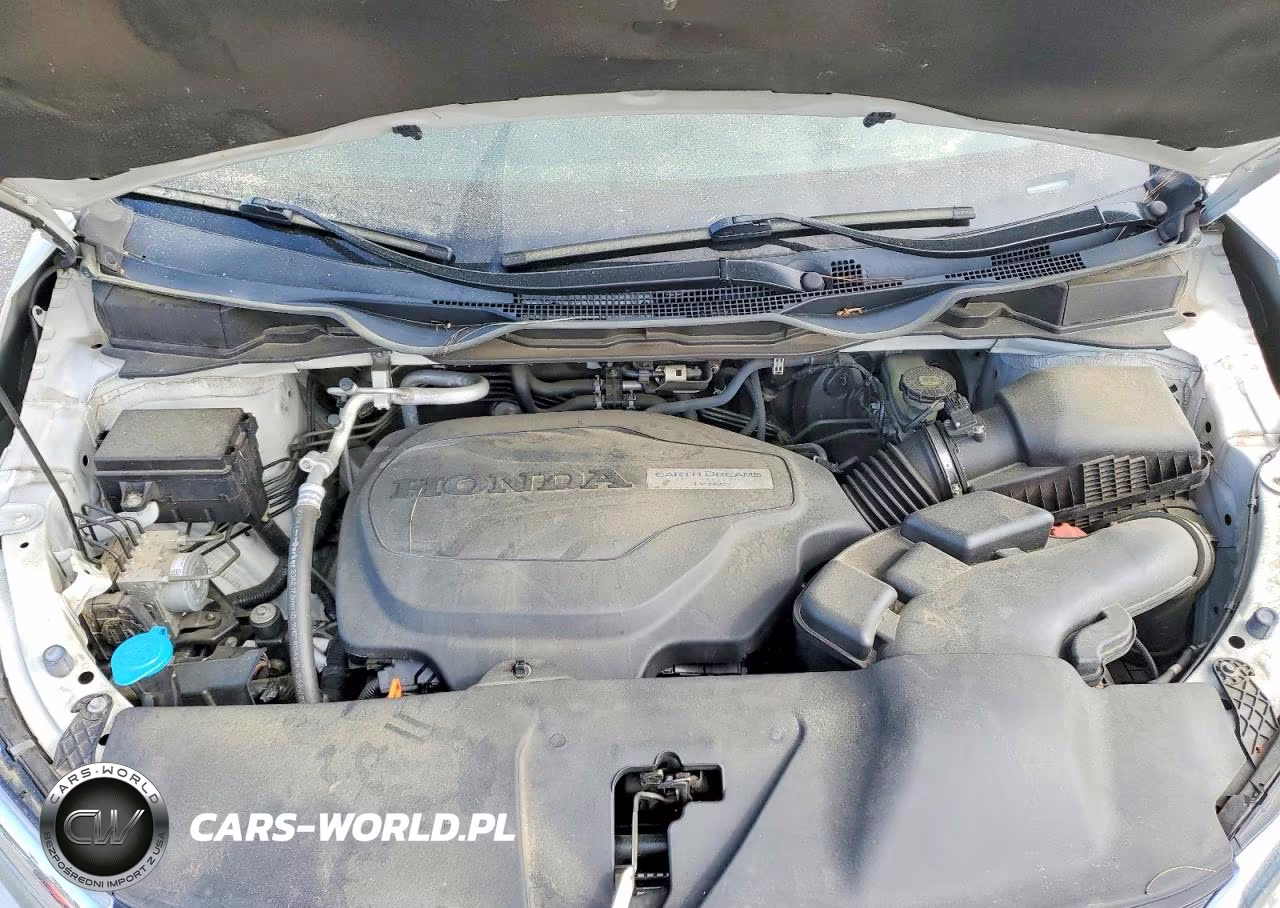 2018 Honda Odyssey Touring VIN:5FNRL6H85JB039374 - 12