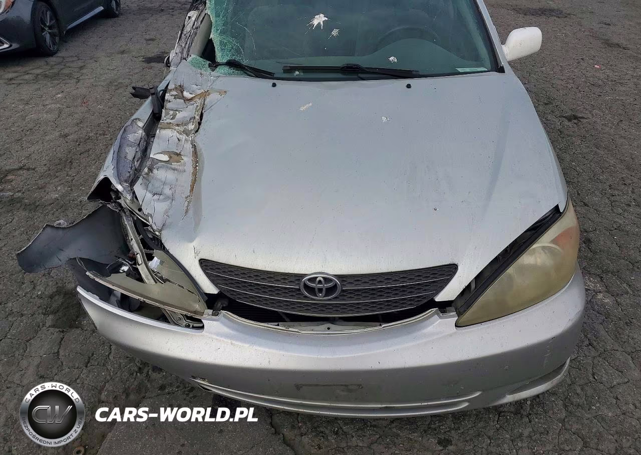 2002 Toyota Camry Le VIN:JTDBE32K220012311 - 11