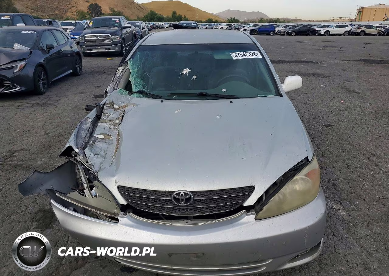 2002 Toyota Camry Le VIN:JTDBE32K220012311 - 5