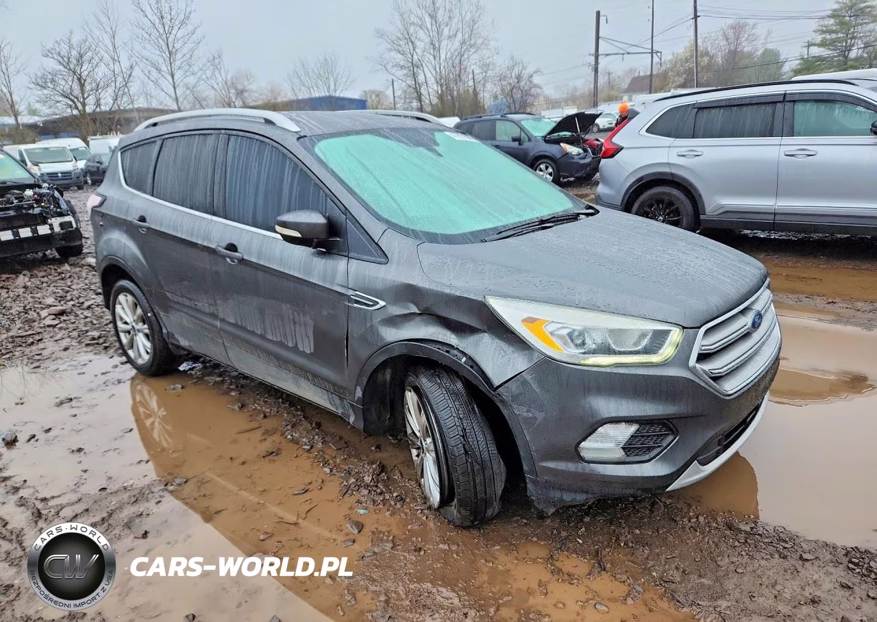 2017 Ford Escape Titanium VIN:1FMCU9J91HUD55813 - 4