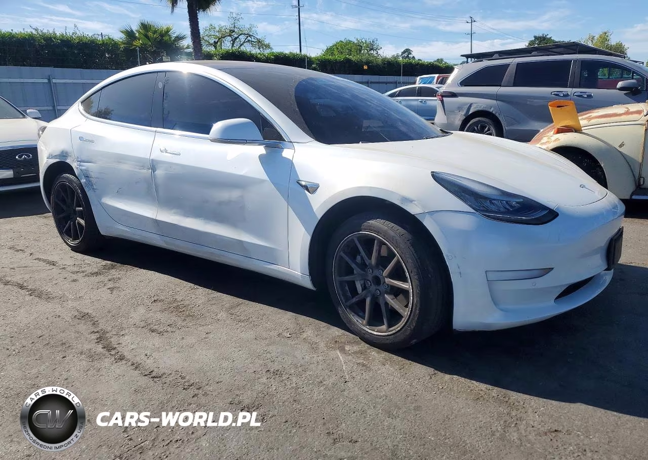 2018 Tesla Model 3 VIN:5YJ3E1EAXJF161657 - 4