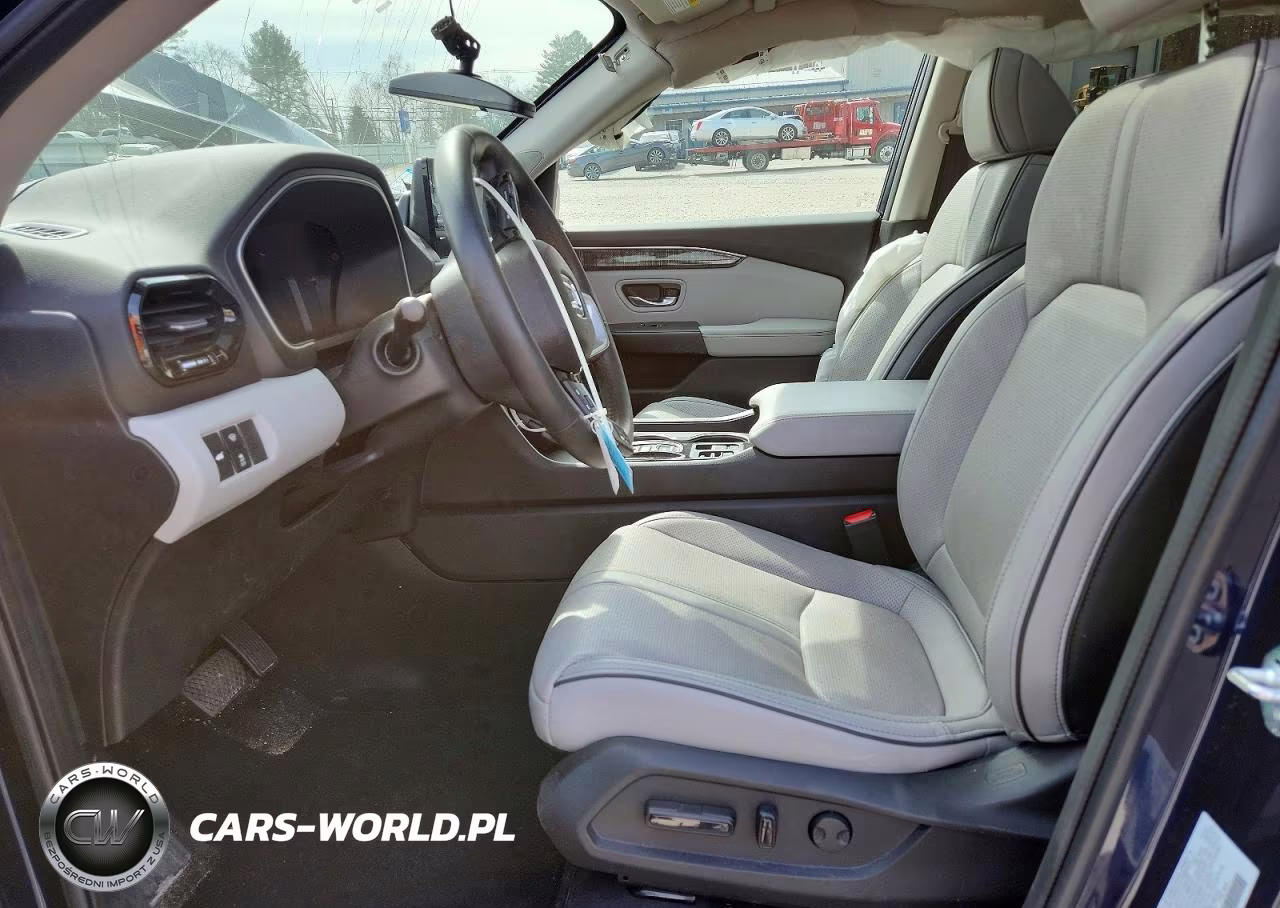 2023 Honda Pilot Elite VIN:5FNYG1H86PB011627 - 7
