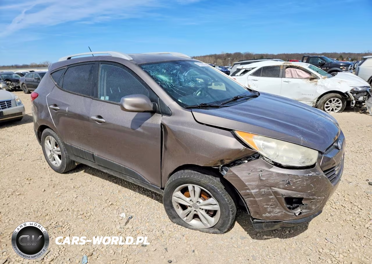 2011 Hyundai Tucson VIN:KM8JUCAC3BU201577 - 4