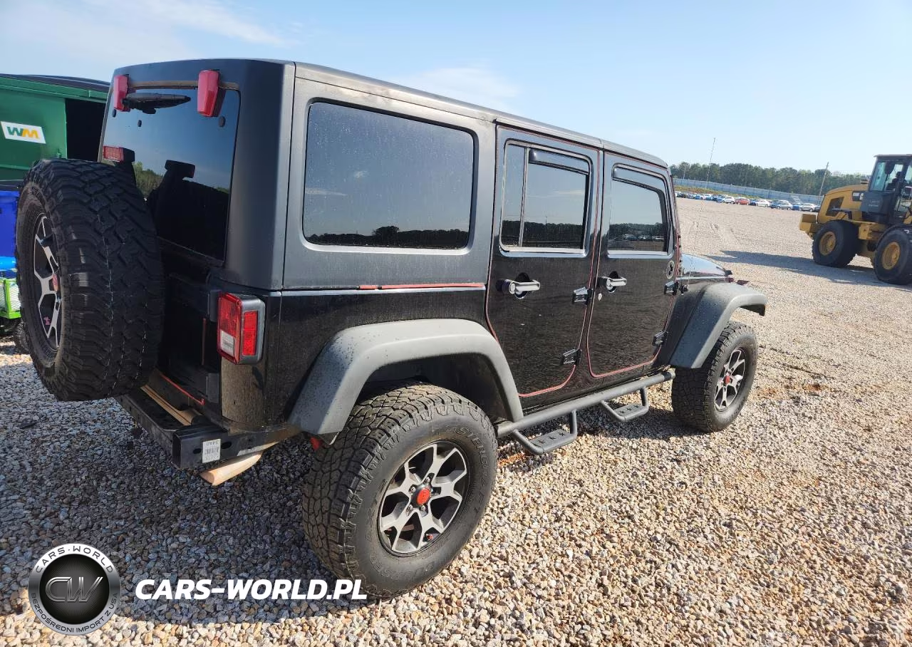 2011 Jeep Wrangler Unlimited Rubicon VIN:1J4BA6H18BL616112 - 3