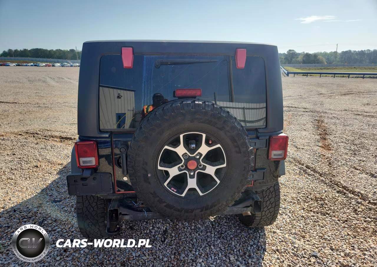 2011 Jeep Wrangler Unlimited Rubicon VIN:1J4BA6H18BL616112 - 6
