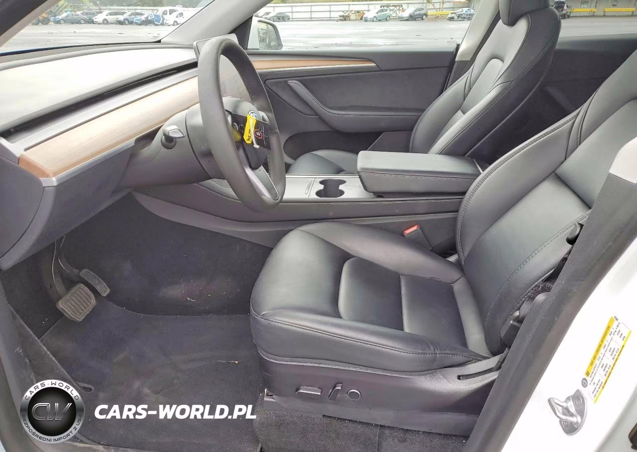 2023 Tesla Model Y VIN:7SAYGDEE7PF675546 - 7