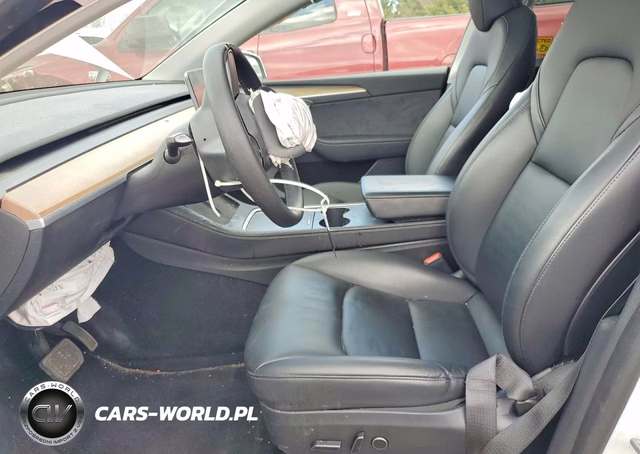 2023 Tesla Model Y VIN:7SAYGDEE3PA051854 - 7