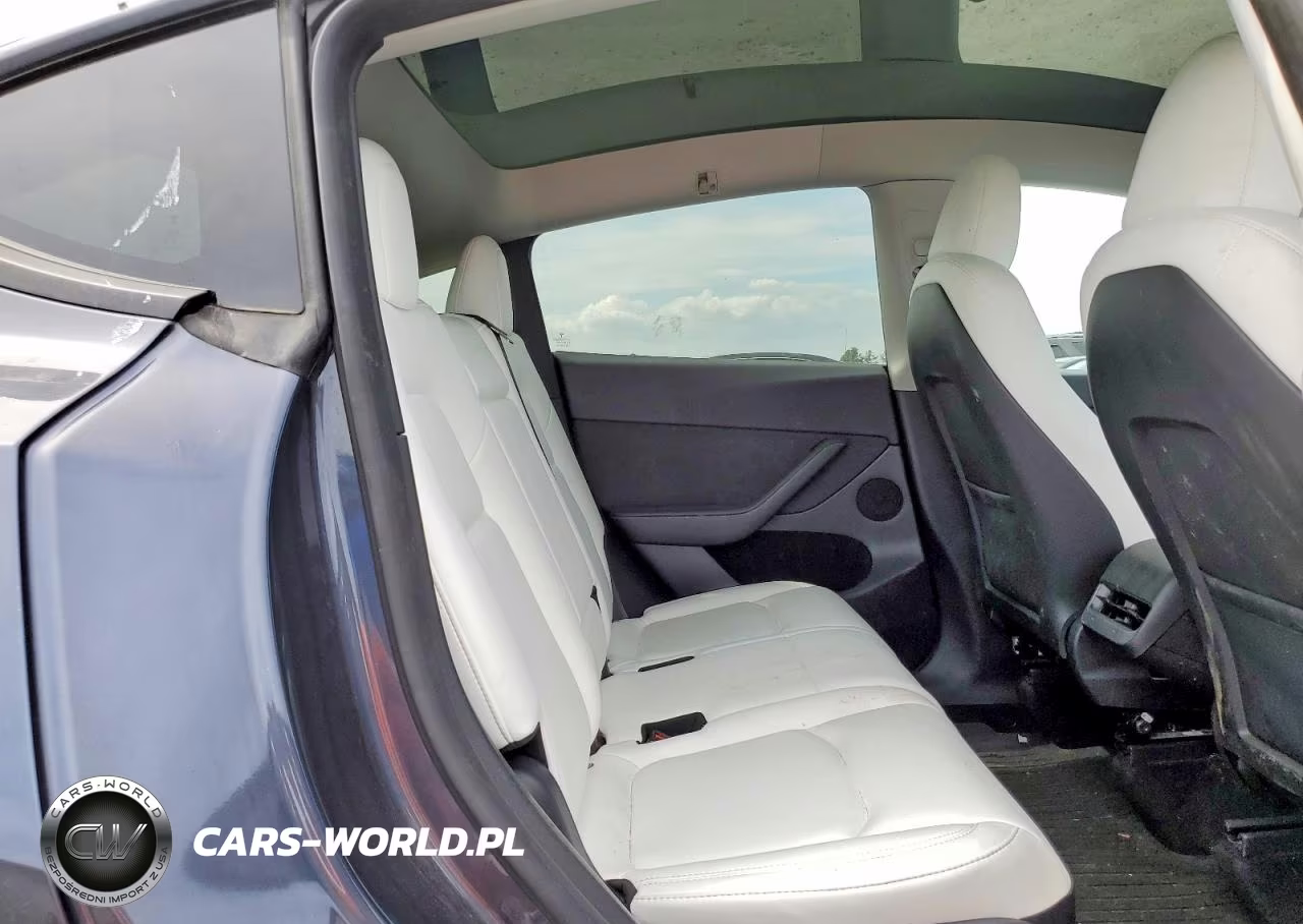 2023 Tesla Model Y VIN:7SAYGAEEXPF852086 - 11