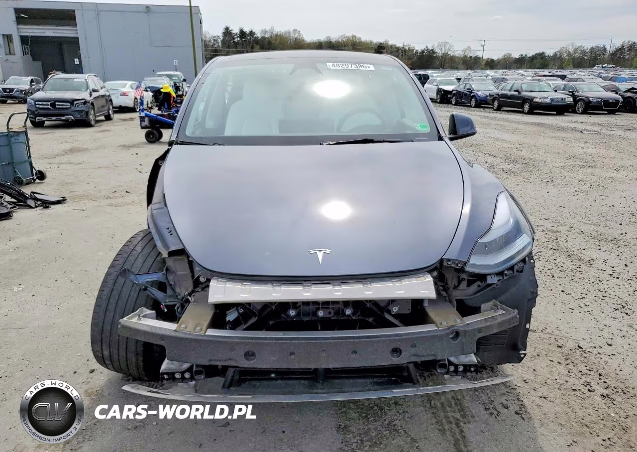 2023 Tesla Model Y VIN:7SAYGAEEXPF852086 - 5