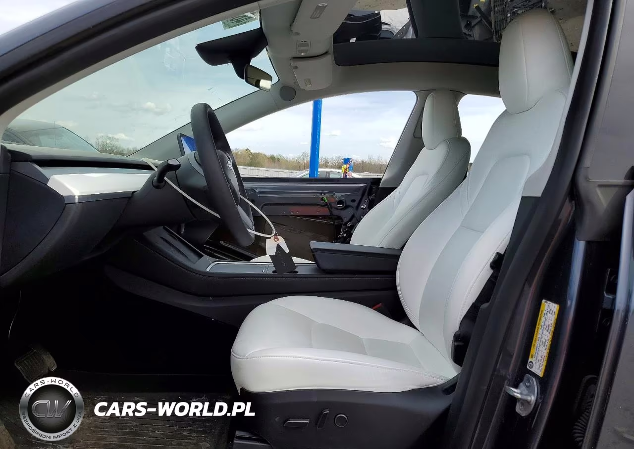 2023 Tesla Model Y VIN:7SAYGAEEXPF852086 - 7