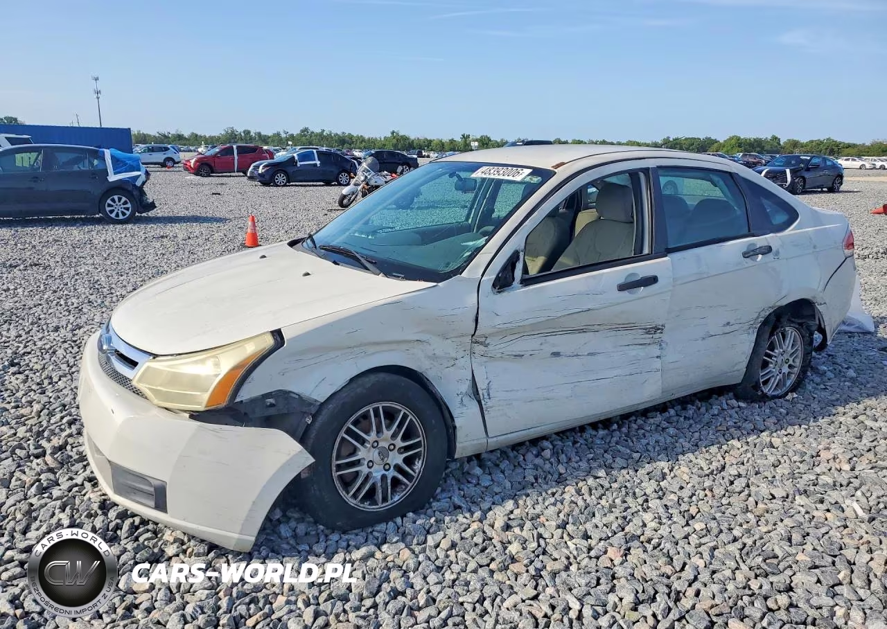 2009 Ford Focus VIN:1FAHP35N19W110012 - 1
